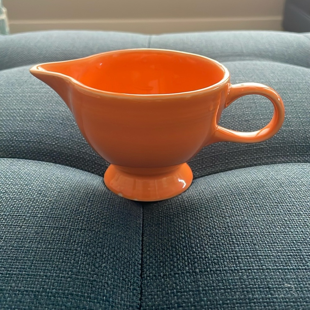 Vintage Fiestaware Orange Creamer approximately 4”